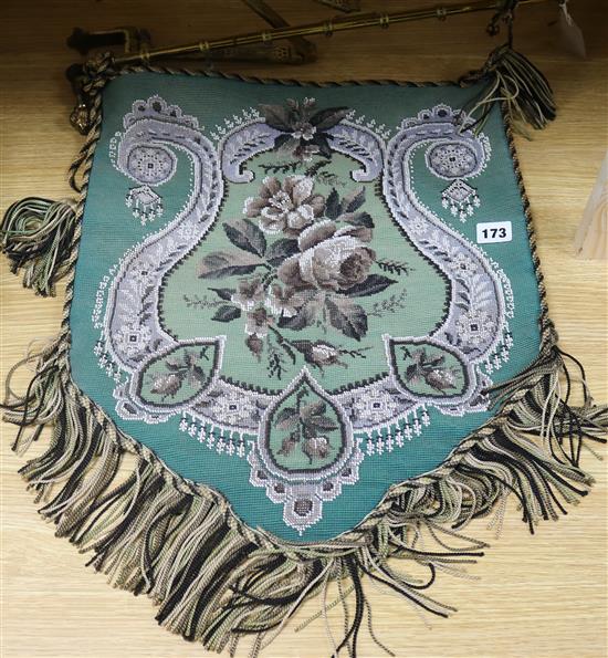 A Victorian shield-shaped beadwork adjustable fire banner,